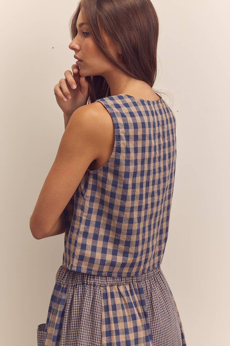 Regina  Sleeveless Button-Down Top
