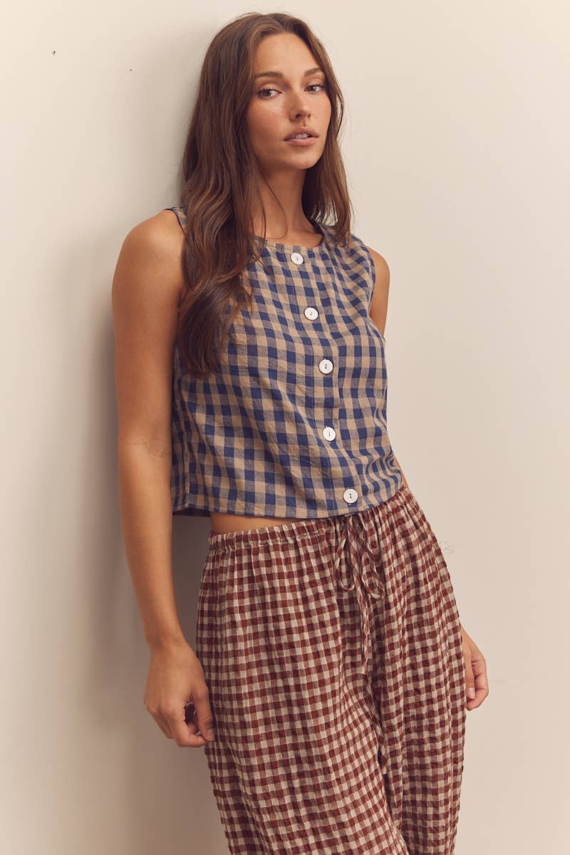 Regina  Sleeveless Button-Down Top